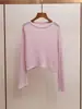 Ropa de Mujer de Gama Alta de Shenzhen Llegada Nueva de Primavera Estilo Minimalista Francés Color Sólido Cuello Redondo Holgado Manga Larga Punto Básico