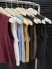 Regata canelada de algodão com gola redonda e sem mangas, estilo minimalista para mulheres, estilosa, rejuvenescedora, versátil, elegante, modeladora, adequada para usar por cima ou como camada, top da moda