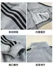 Nuevo conjunto deportivo con cremallera para niños transfronterizo con tres rayas, ropa deportiva para niños y niñas, estilo primavera y otoño, conjunto de dos piezas para niños mayores