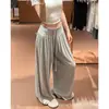 Pantalón falda ancho de corte holgado en color gris claro para mujer, estilo otoño, con diseño de cintura de encaje, pantalón casual con un ambiente relajado