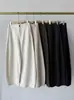 Pantalones de lana y acetato de pierna curva - adelgazantes, de cintura alta, casuales y con un diseño deconstruido