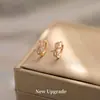 Aretes de moño en oro rosa, aretes pequeños y exquisitos, tachuelas únicas de nicho para mujer de verano, nuevos accesorios para orejas de moda 2026