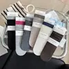 Calcetines de dibujos animados lindos para mujer, calcetines de otoño de lunares hasta la pantorrilla, calcetines finos de algodón de estilo japonés de moda, calcetines holgados estilo universitario