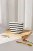 Bolsa de maquillaje simple a rayas bicolor, portátil y artística, adecuada para viajes, almacenamiento de productos para el cuidado de la piel, bolso de mano, bolsa tipo almohada