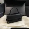 Bolsa pequena com textura retrô feminina 2026 nova moda francesa bolsa de ombro única versátil novo produto bolsa de mão bolsa transversal pequena quadrada