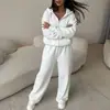 Colección de otoño nueva para exportación europea y americana 2026: conjunto de sudadera corta de color liso con cremallera y pantalones de pierna ancha, estilo casual deportivo