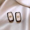 Pendientes de plata con luz de aguja, de lujo, de circonita negra de alta gama, con un toque de amor, pendientes geométricos de temperamento nicho, con un diseño único y sentido del humor.