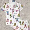 Novo conjunto de pijama feminino de duas peças com estampa de desenho animado TK da loja independente da Amazon, com gola, feito de seda de leite, para usar em casa