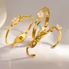 Pulsera de Acero Inoxidable Estilo Chino Ins con Diseño Único de Flor, Sensación de Lujo Ligero y Alta Gama, Pulsera de Acero de Titanio, Brazalete Abierto para Mujer