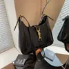 Bolsa de Ombro Feminina Retro Francesa Popular 2025 Nova Tendência Versátil Elegante Bolsa Transversal Super Popular