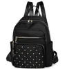 Mochila grande de mujer simple estilo coreano con textura transfronteriza, costuras de diamante y remaches, mochila de mujer a la moda