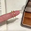 Exquisito Anillo de Lujo Minimalista con Forma de Serpiente y Estrella de Cuatro Puntas Versátil Anillo de Doble Capa Moda de Nicho Producto Nuevo Anillo Abierto Ajustable