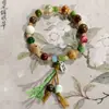 Fabricantes suministro pulsera de cachorros de cerámica diseño de nicho pulsera nuevo chino lindo cachorros huesos cuentas juguetonas