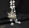 Collar de Perlas de Camelia que Gotea Aceite Nueva Moda para Mujer Exquisita Cadena Larga para Suéter Colgante Versátil de Ropa de Alta Gama