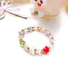 Venta al por mayor de fábrica Comercio exterior Estilo coreano Pulsera de cristal de mariposa Joyería de moda para mujer Pulsera de cristal Pulsera Fresca y dulce