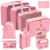 Set organizador de viaje premium, incluye 11 piezas: bolsas para guardar ropa, bolsas con cordón, bolsas para cosméticos y artículos de tocador, y bolsas de malla plegables para almacenamiento