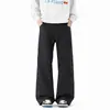 Pantalones casuales de corte estrecho e inclinado para hombre y mujer, con un moderno diseño de remaches, versátiles para el otoño, corte holgado, talla grande, estilo high-street, pantalones de pierna recta