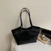 Bolso tote vintage de gran capacidad para mujer, nuevo modelo otoño 2026, uso diario versátil, sensación de alta gama, bolso de hombro y para llevar debajo del brazo