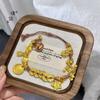 Pulsera de Monedas de Cinco Emperadores Doradas Abundantes Estilo Mismo que la Tienda de Oro Puzuo para Mujer, Nueva Pulsera Trenzada Retro China