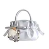 Bolso nube de gama alta de nicho para mujer, nuevo bolso cruzado versátil primavera-verano 2026 para niñas, bolso de cubo de mano a la moda