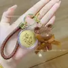Oro Puro 999 Moneda Pequeña Hilo de Resina Oso Llavero Bolso de Moda Accesorio Llavero de Coche Colgante Lindo