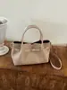 Bolso de Mano de Felpa y Gamuza para Mujer 2026 Nuevo Estilo Moderno Tacto de Alta Gama Bolso de Hombro Único Bolso Cruzado Tipo Cubo de Felpa y Gamuza Exquisito