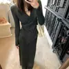 Conjunto de Tricô Irregular para Mulheres Inspirado em Design de Outono e Inverno, Estilo de Comércio Exterior Transfronteiriço, Elegante Conjunto de Duas Peças com Suéter Acinturado e Saia