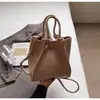 Moda Nueva Primavera y Verano 2026 Bolso Cubo de Color Sólido Simple de Gama Alta Bolso Cruzado Versátil Elegante para Mujer