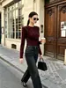 Top de punto plisado de cuello redondo transfronterizo, colección otoño 2026, capa interior elegante, camiseta básica de manga larga de color liso, moda femenina de alta gama