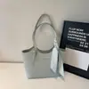 Bolsa Tote Texturizada de Mão de Alta Qualidade no Atacado para Mulheres Nova Coleção Outono 2026 Cor Sólida Simples Bolsa de Ombro para o Dia a Dia Bolsa de Axila