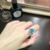 Anillo de Huevo de Ganso Tesoro de Color Brillante Zafiro para Mujer Chapado en Oro de 18 Quilates Circonita Multifacética Diamante Completo Índice Dedo Anular Joyería de Lazo