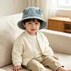 Estilo de mezclilla lavada para bebés y niños, nuevo y elegante sombrero de pescador lindo con orejas y cordón personalizado