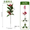 Verdor artificial transfronterizo con piñas y ramas de acebo, bayas rojas brillantes, plantas verdes artificiales, materiales florales decorativos hechos a mano para fiesta de Navidad