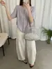 Cardigan de Punto Fino Estilo Coreano Verano 2026 Nuevo Holgado de Manga Corta con Rayas y Cuello Redondo con Diseño Único para Mujer