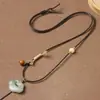 Nuevo colgante de jade Hetian tejido a mano con cordón de collar ajustable de alta gama