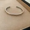 Pulsera Abierta de Piedras con Goteo de Aceite Estilo Étnico, Pulsera de Moda Personalizada Trendy con un Diseño Único, Accesorio de Mano de Nicho