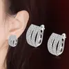 Pendientes de línea en espiral de comercio exterior europeo y americano, pendientes, pendientes, deseo, venta caliente, pendientes de arcoíris de rima de diamantes huecos multicapa llenos