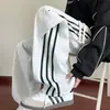 Pantalones Deportivos Rectos de Bloques de Color y Rayas Retro de Moda para Jóvenes 2026 para Hombres y Mujeres Primavera Verano Sueltos Versátiles para Pareja Pantalones Largos