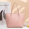 Bolso tote bordado de onda de agua de alta calidad 2025 nueva moda generoso gran capacidad color sólido cremallera bolso de hombro para mujer