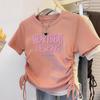 Camiseta Feminina 100% Algodão Manga Curta Ombro Direito 2025 Novo Verão Slim Design Cintura com Cordão Doce Hottie Top