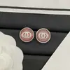 Nuevos Pendientes Redondos con Tachuelas de Diamantes Doble C Estilo Chanel 2025 para Mujer con Agujas de Plata, Pendientes Dopamina de Alta Gama