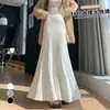 Foto real falda plisada de punto super bonita falda de invierno de longitud media para mujer otoño e invierno falda de cola de pez drapeada que se ajusta a la cadera falda larga petite