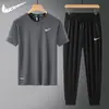 Conjunto Esportivo de Seda de Gelo Masculino Casual de Verão Camiseta de Manga Curta Fina e Calça Longa Conjunto Completo para Corrida Secagem Rápida Conjunto de Duas Peças para Homens