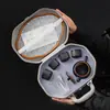 Juego de té de viaje de arcilla púrpura, que incluye una tetera y cuatro tazas, juego de té kung fu portátil para exteriores, tetera y tazas Fengming, juego de regalo de alta gama