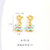 Color Fuerte que Conserva Arena Dorada Accesorios DIY Dibujos Animados Avión Pequeño Oso Fresa Unicornio Caballo Mecedora Colgante Colgante Pulsera
