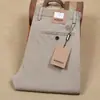 Pantalones casuales de hombre de moda rectos, delgados, transpirables, absorbentes de sudor, de algodón peinado, elásticos, para primavera y verano, nuevos de 24 años