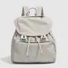 Bolso nuevo de estilo coreano, fresco y elegante, bolso tote de lona portátil, bolso de hombro y mochila, perfecto para un look de vacaciones moderno, disponible en negro y rojo
