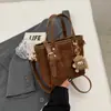 Bolso de Mano de Cubo Sólido de Moda para Mujer 2026 Nuevo Otoño Temprano Bolso de Hombro Vintage Bolso Cruzado Casual para Viajar Tendencia