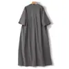 Vestido de Verano 2026 Nuevo de Algodón y Lino de Longitud Media con Bolsillos Grandes, Corte Relajado, Vestido Camisa de Manga Corta Adelgazante
