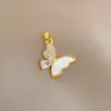 Cobre Oro Real Concha Blanca Mariposa Dorada Soñadora Moda Transfronteriza DIY Joyería Cobre Circonita Microincrustación Colgante